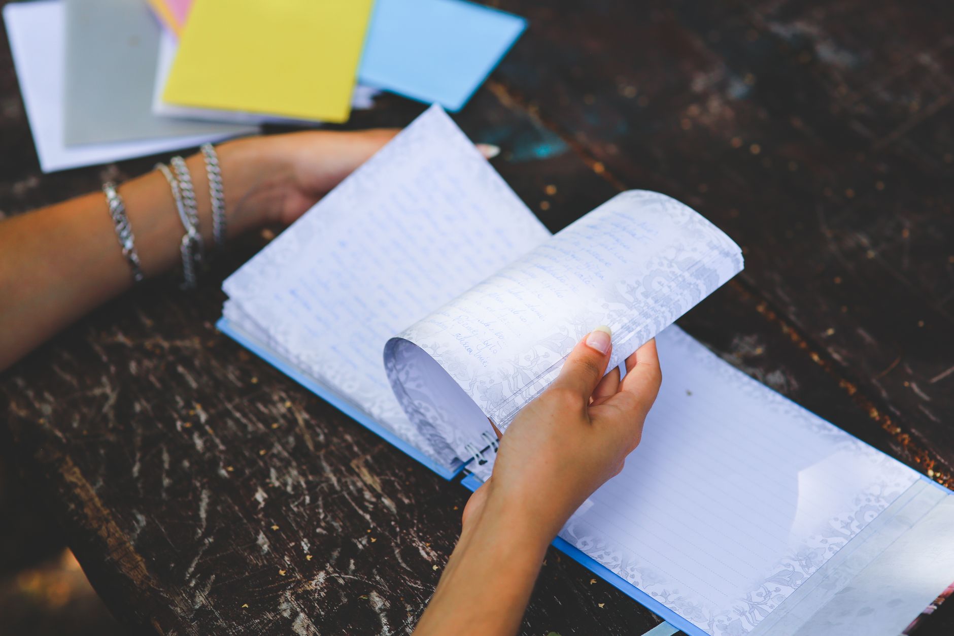 notebook in hands