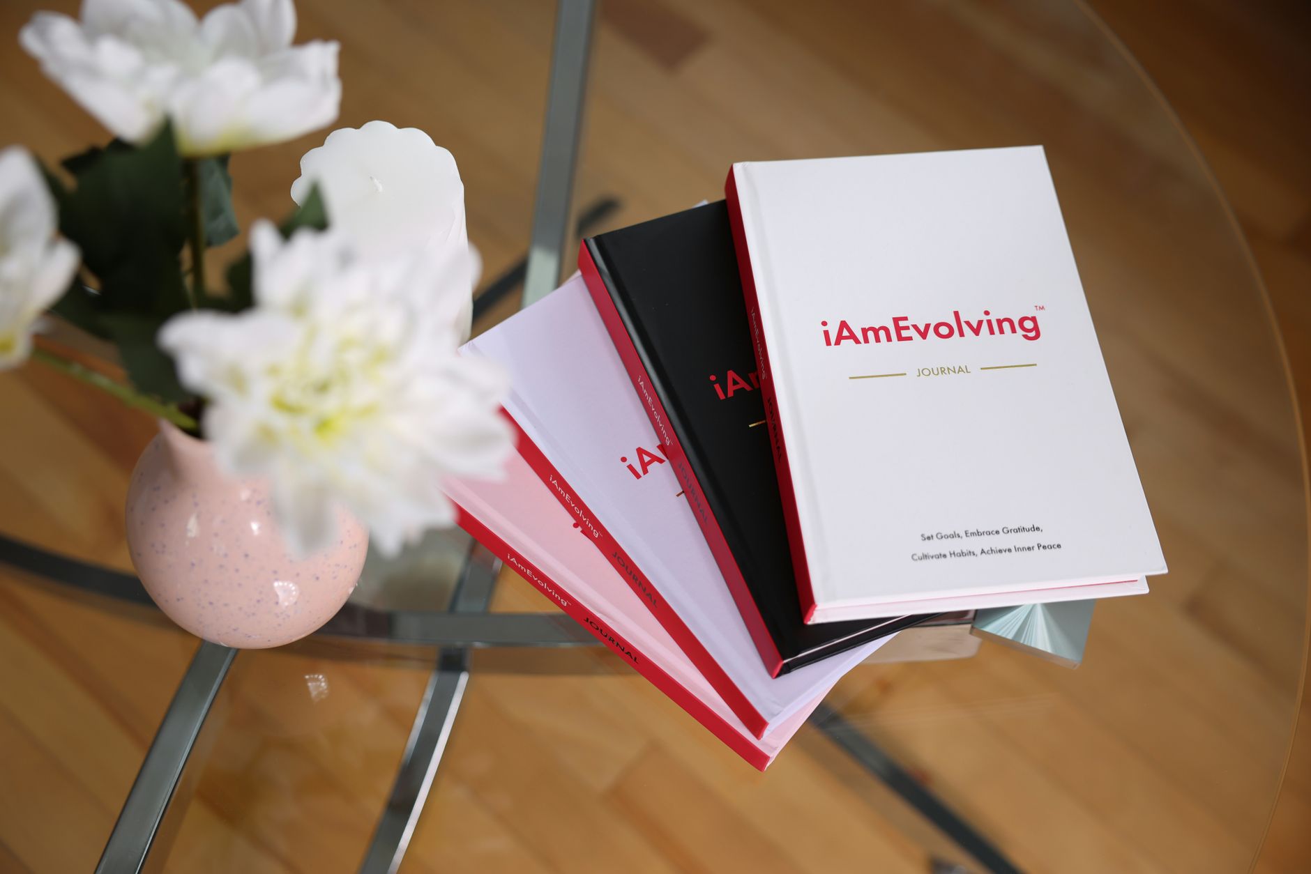 elegant journaling setup with iamevolving books and flowers