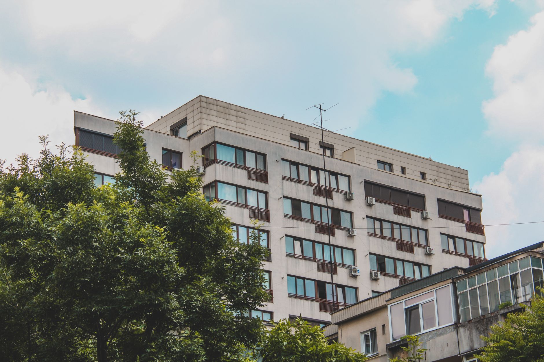 residential buildings and trees in city