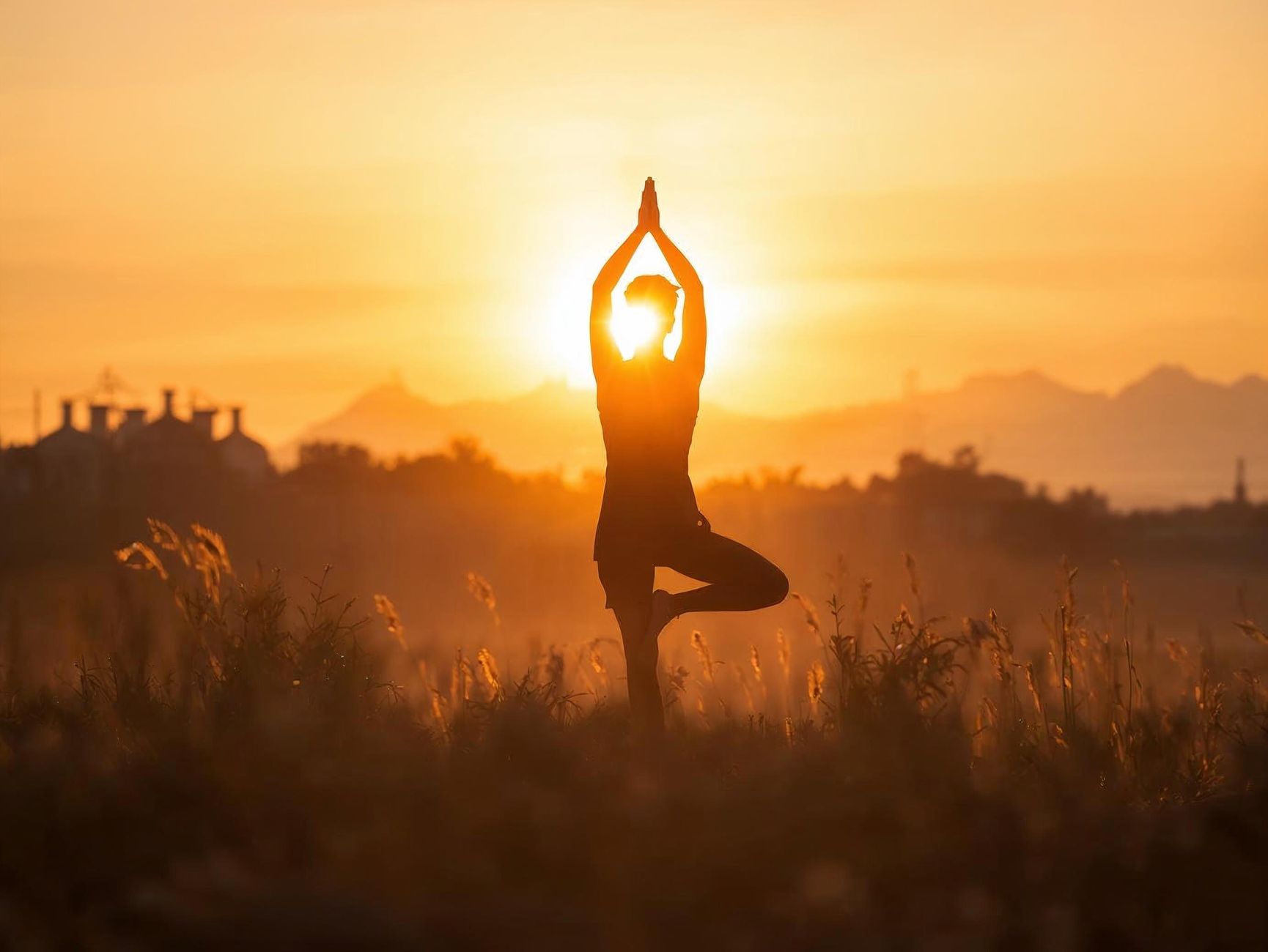 yoga practice in a sunset field setting