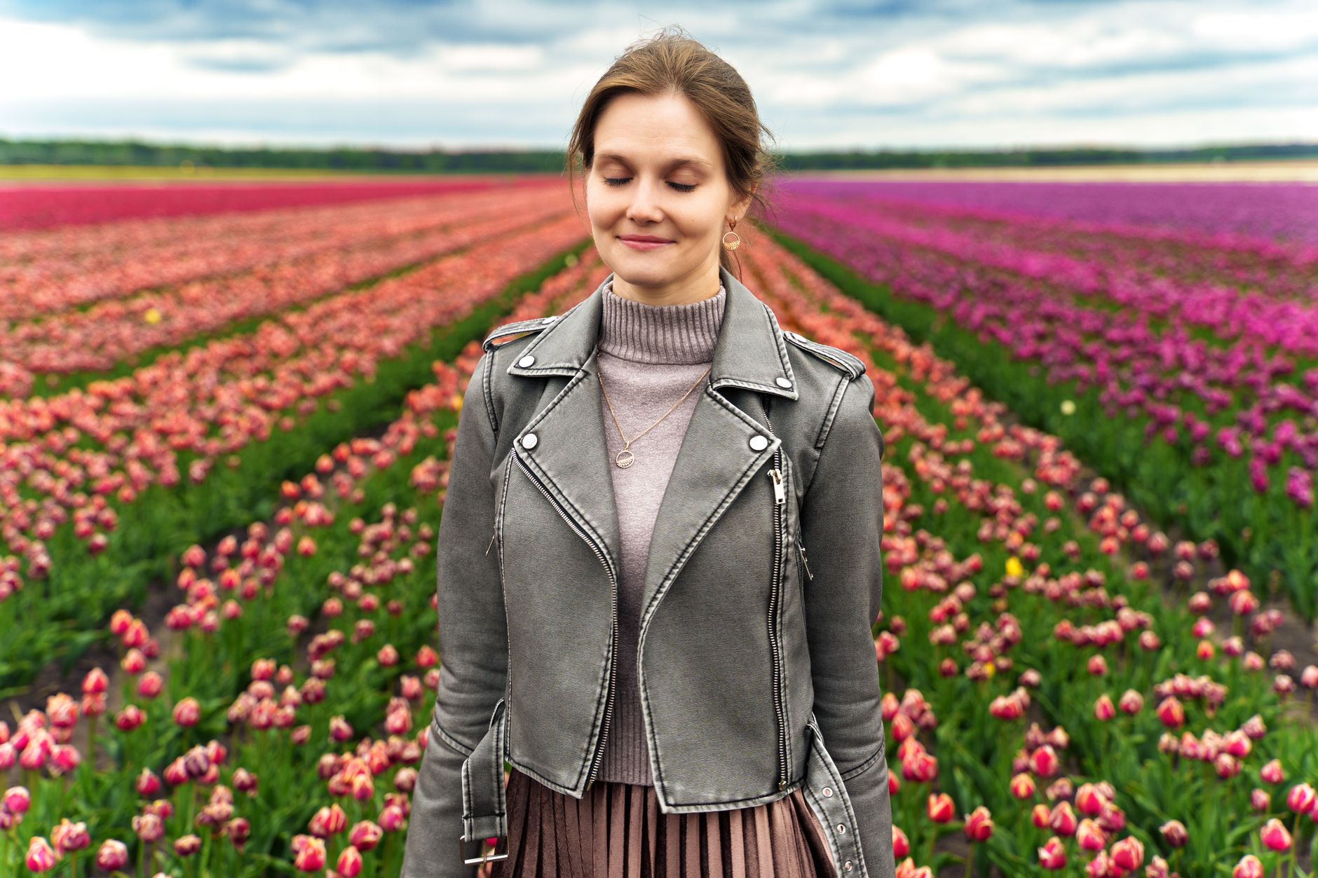 serene moment in vibrant tulip field