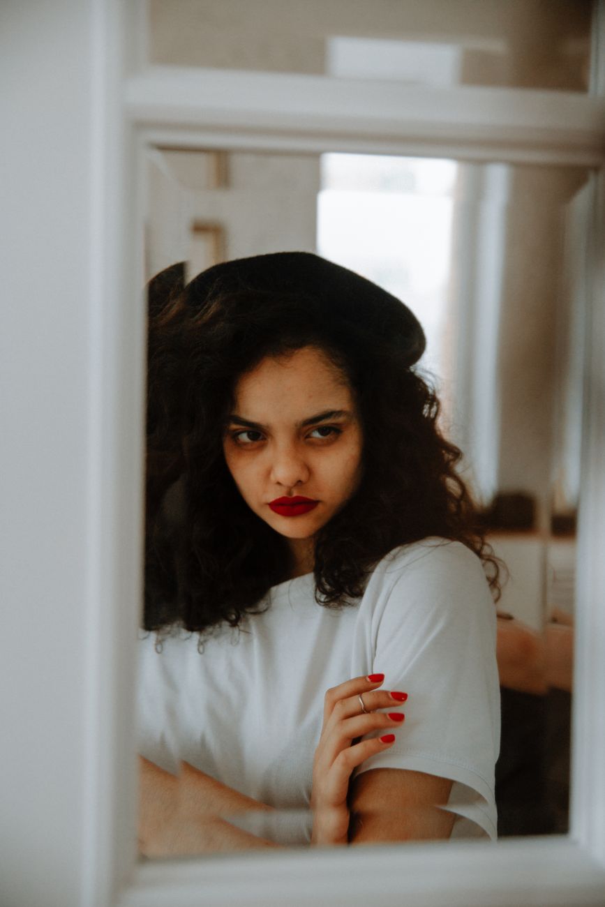 reflection of woman in mirror