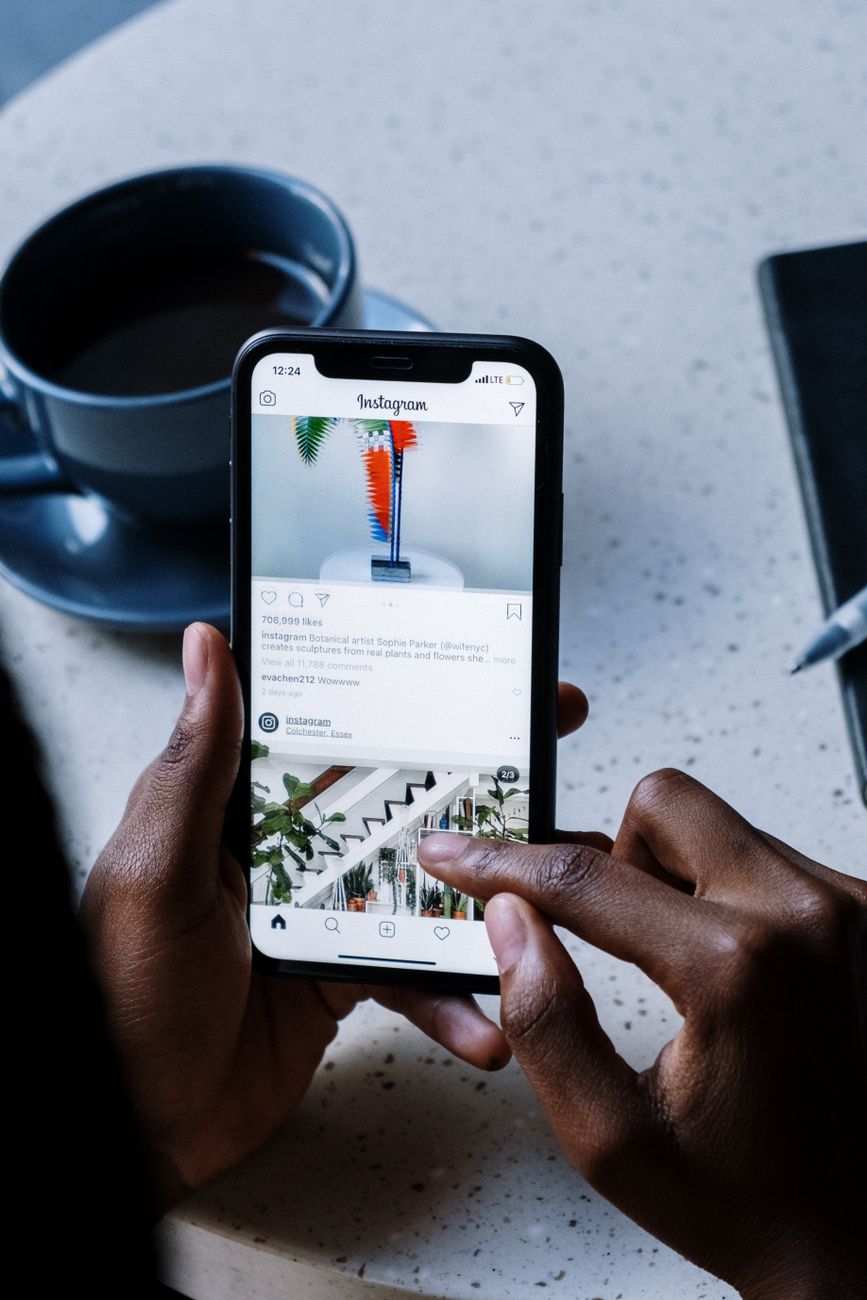 person holding black android smartphone