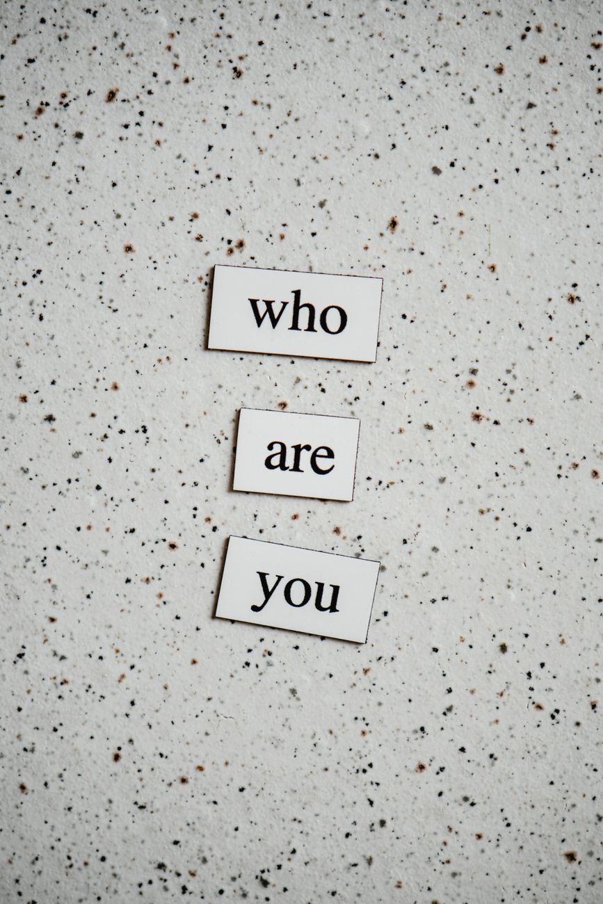 text cutouts on a dotted background