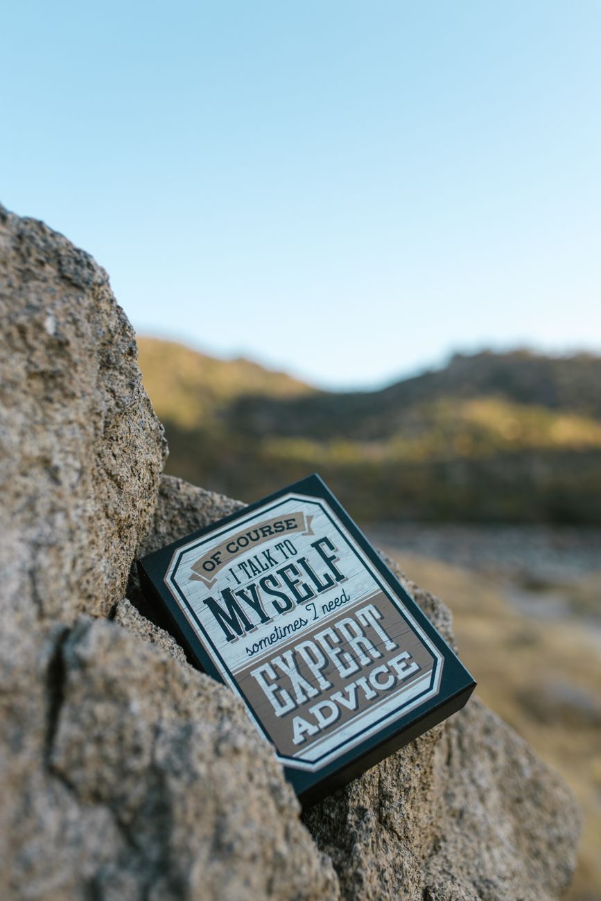 small box with text on gray rock